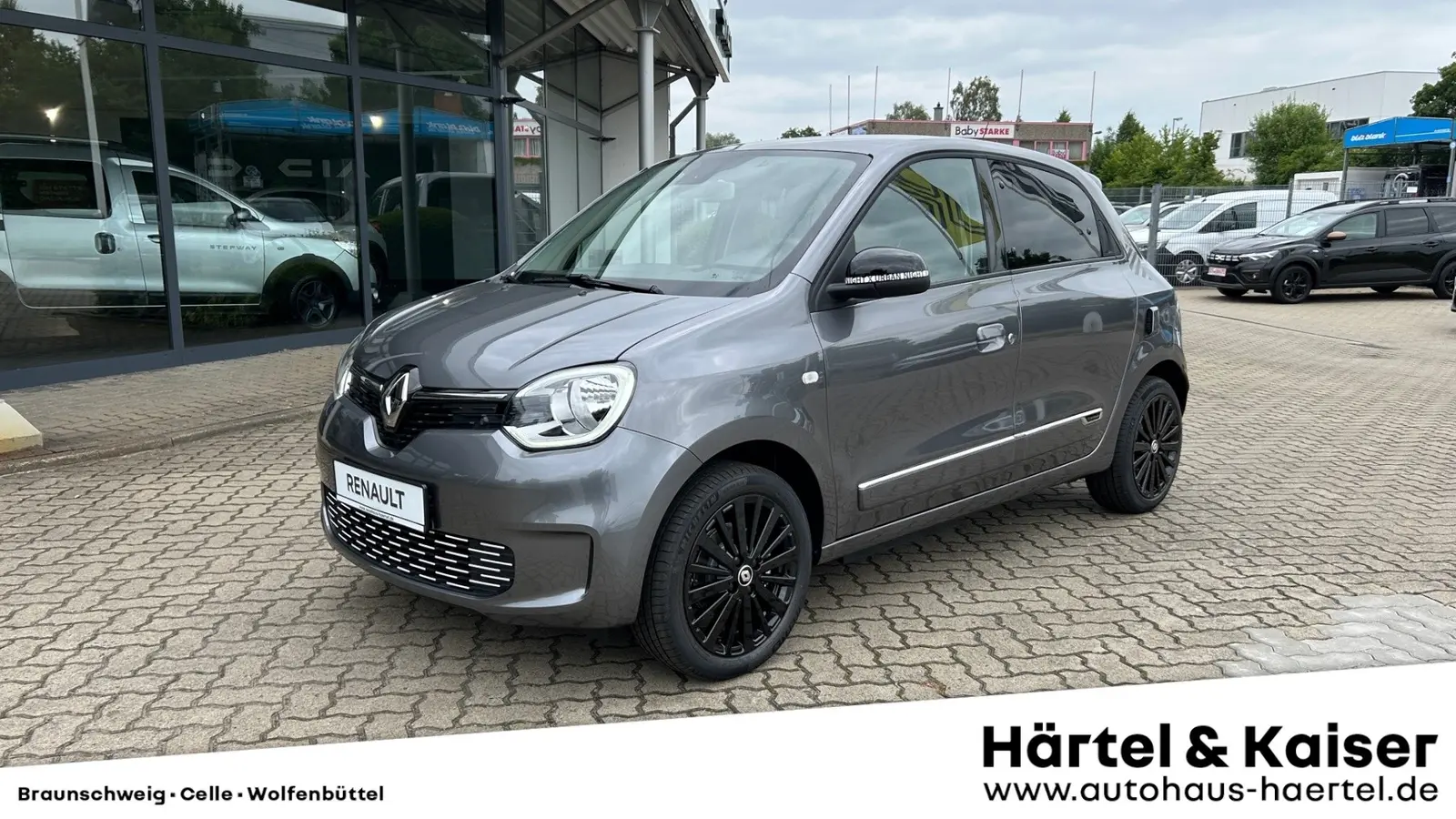 zu sehen ist ein grauer Renault Twingo 