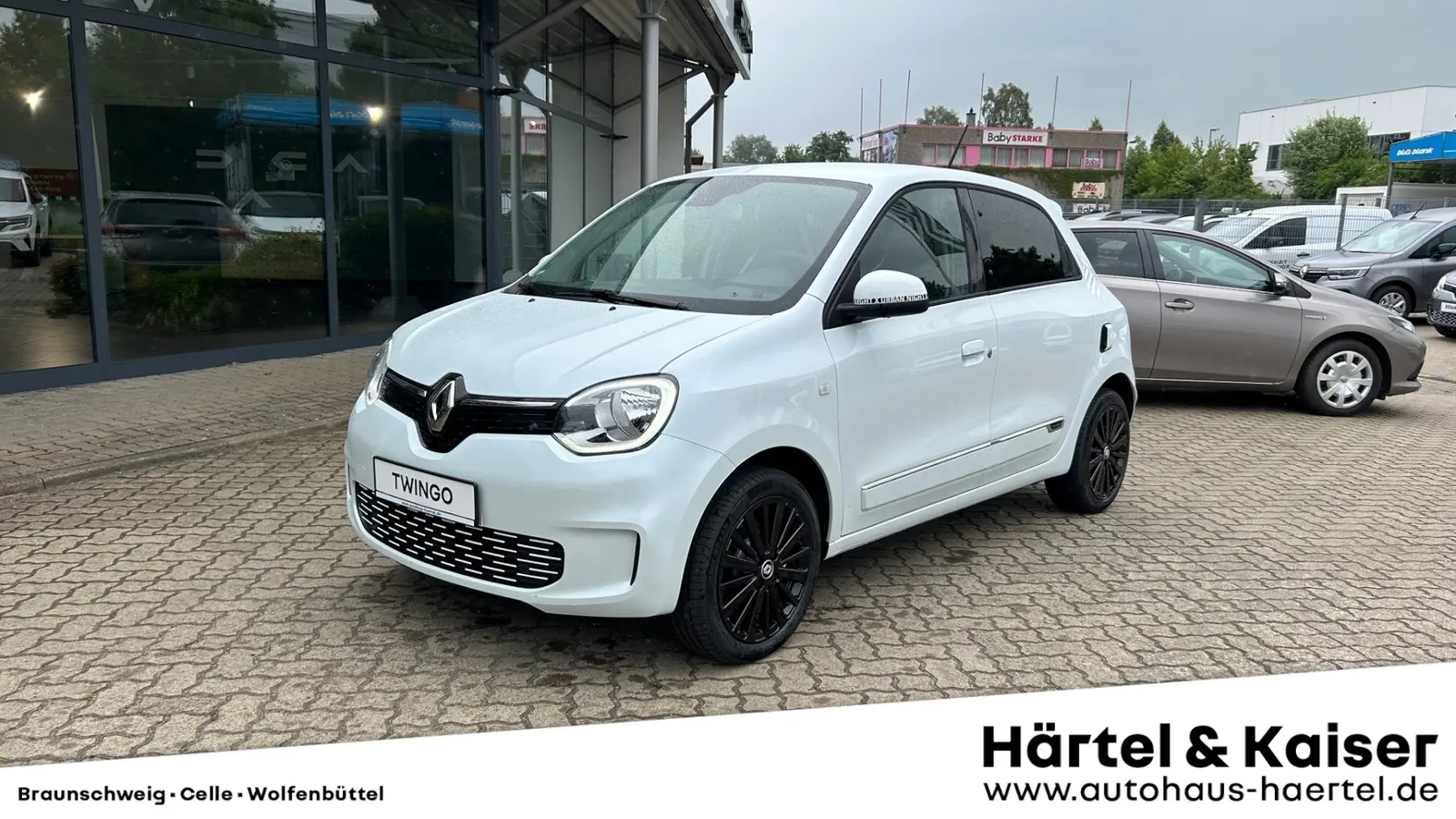 zu sehen ist ein weißer Renault Twingo 